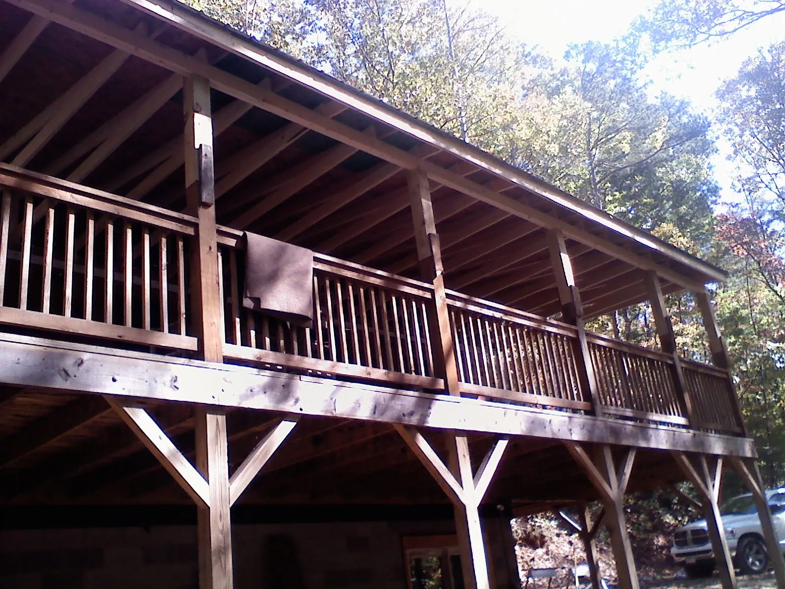 Timber framing under a new elevated porch and deck — Roof Leak Repair in Newton Grove by Roofing Brothers